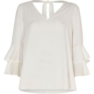 White double bell sleeve top